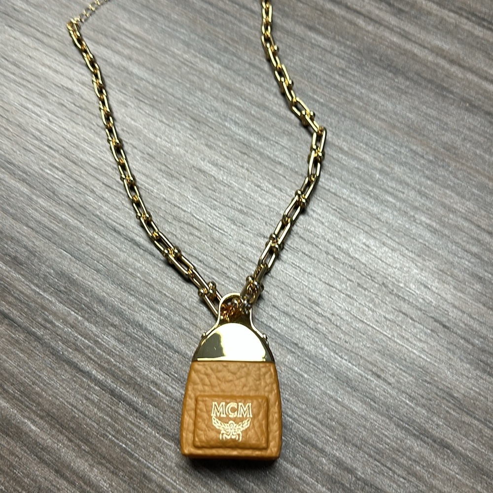 MCM Gold and Brown bottle